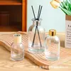 Botella difusora de aroma de vidrio cilíndrico transparente para el hogar y el hotel, botella difusora decorativa con flores secas y varillas, botella dispensadora de aroma para aceites esenciales