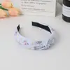 Diadema de lazo simple estilo coreano, accesorio para el cabello de tela anudado para niños fresco y dulce con flores pequeñas, diseño único y de nicho