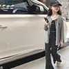 Pantalones de campana florales estilo coreano nuevos para otoño 2026 para niñas, pantalones de pierna ancha holgados de cintura alta para adelgazar para niñas en primavera y otoño