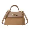 Bolso de gamuza de nicho para otoño e invierno para mujer, nuevo bolso cruzado versátil vintage 2026, exquisito mini bolso Kelly
