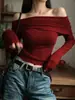 Estilo francés suave top de un solo hombro liso de color suave para mujer otoño nuevo temperamento de deseo puro suéter de punto off-the-shoulder blanco