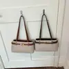 26 bolsos tote nuevos de estilo vintage para mujer para el uso diario, bolsos de hombro de nicho, bolsos cruzados versátiles de gran capacidad