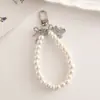 Nuevo Llavero de Perlas Colgante de Cuentas Colgante de Lazo Llavero de Oso con Lazo Placa Metálica Pulsera de Perlas