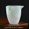 Taza de té de porcelana de jade vidriada verde, separador de té para uso doméstico, taza de té individual resistente al calor y que no quema