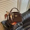 Bolsa Cruzada de Hombro Tendencia Chic Estilo Coreano Primavera 2026 Bolso de Mano Texturizado de Moda Simple para Viajes Diarios para Mujer