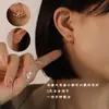 Wang Ziwen con temperamento de estilo ins una variedad de pendientes de bolas de acero de cara redonda pendientes delgados nuevas joyas de acero de titanio F442