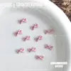 Conjunto Misto de Decorações para Unhas com Laços de Resina Rosa de 12 Peças, Acessórios Populares 3D de Laços para Unhas DIY