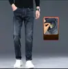 Jeans de Hombre de Primavera Hombres Venta al por Mayor Nuevos Rectos Sueltos Elásticos de Marca de Moda Adelgazantes Retro Americano Pantalones Largos Verano
