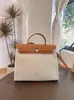 Bolso de Lona Impermeable de Lujo Ligero de Nueva Entrada Transfronteriza Bolso de Inicio Kelly Bolso de Mano para Mujer de Cuero Genuino para Hombro Cruzado
