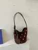 Bolso de mano único de lunares para mujer, bolso tote pequeño exquisito y súper popular, nuevo bolso de hombro versátil de moda 2026, bolso tipo cubo personalizado