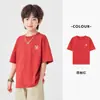 Camiseta bordada linda para niños de Duoduo, ropa infantil de venta caliente en verano, color liso versátil moderna de algodón puro fresca de manga corta