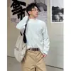 Nueva colección de otoño e invierno: Camiseta de manga larga para hombre, moderna, de corte holgado, texturizada, con cuello mandarín, perfecta como capa interior o como base oversized.