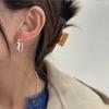 Aretes de metal huecos con forma de gota de agua chapados en oro latón, simples, estilo frío ins, elegantes europeos y americanos, combinan con todo para mujer