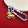 Pingente dourado em formato de ovelha com folha de ouro, corrente para celular, chaveiro, amuleto de fio vermelho, ovelha do zodíaco, decoração de Ano Novo, pequeno presente