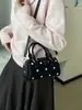 Bolso de concha de lunares de estilo coreano de moda, nicho de lujo ligero, nuevo modelo 2026, bolso de hombro con colores contrastantes y elegante diseño cruzado