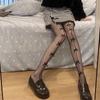 Calcetines de rejilla con lazo blanco para mujer, pantimedias finas y sexys tipo JK, con estampado de leopardo, medias negras de un solo cuerpo.