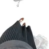 Falda midi gris de alta gama estilo francés para mujer, nueva colección otoño/invierno 2026, con una caída fluida, elegante diseño plisado y un dobladillo largo y moderno