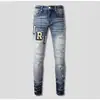 Pantalones vaqueros skinny ajustados y rasgados de color claro para hombre con parche de letra AMR, marca de moda de alta gama transfronteriza, elásticos