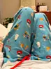Calça de pijama de fleece com estampa de desenho animado colorida, com bolsos, cordão ajustável, modelagem solta para uso casual em casa