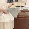 Conjunto de Verano para Niñas 2026 Estilo Miu Top de Punto Calado de Manga Corta Falda Corta Floral Estilo Ballet