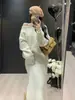 Traje de Punto de Color Sólido Estilo Perezoso Nuevo Primavera para Mujer, Suéter Pulóver con Lentejuelas y Falda de Cintura Alta Conjunto de Dos Piezas