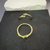 Venta al por mayor de joyería popular de nicho transfronteriza: Anillo de Latón Chapado en Oro con Microincrustaciones de Circonita, Anillo Abierto de Flor Estilo Europeo y Americano