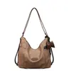 Bolsa Tote Casual Multifuncional Retrô para Mulheres 2025 Nova Grande Capacidade Ins Moda Popular Bolsa de Ombro Transversal
