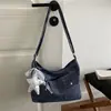 Otoño 2026 Nuevo Bolso de Mezclilla Bolso Cruzado Casual Estilo Perezoso Bolso de Tela Artístico para el Trabajo Bolso Cruzado Pequeño