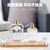 Botellas cuadradas de vidrio de alta transparencia al por mayor para perfume de 30/50/100 ml para fragancias y cosméticos, botellas vacías recargables con pulverizador de presión