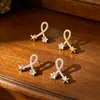 Pendientes de botón de cruz de circonita microincrustada, simples de lujo ligero, diseño exquisito de alto temperamento, pendientes de estrella, joyería para orejas para mujer