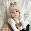 Chapéu de Bebê Qiunan Primavera e Outono 2026 Novo Chapéu Fofo com Proteção para Orelhas Chapéu para Proteção de Orelhas de Recém-Nascido Chapéu Fetal para Bebê