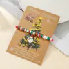 Pulsera de Arcilla Suave Nueva de Navidad Transfronteriza para Mujer, Moda y Versátil con Colgante de Árbol de Navidad Copo de Nieve en Tarjeta de Papel Lista para la Venta