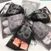 No tejido para el hogar Viaje tamaño grande mediano bolsillo para zapatos pantuflas bolsa con cordón de embalaje bolsa de zapatos no tejida