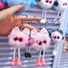 Colgante de lazo con estampado de leopardo transfronterizo, pompón pequeño, llavero de muñeco de dibujos animados para bolso y coche, abalorio exquisito para bolso
