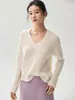 Nuevo suéter de cachemira minimalista con cuello en V para otoño e invierno para mujer, top de punto de manga larga con un dobladillo relajado y ligeramente asimétrico (más corto adelante, más largo atrás)