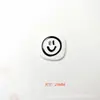 Dopamina Cara Sonriente Accesorios para Joyería DIY Venta al por Mayor Funda para Teléfono Celular Zapatos con Agujeros Pasador Calcetines Paquete de Materiales de Etiqueta de Cuero Parche