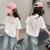Camiseta Casual de Manga Curta 100% Algodão para Meninas Verão 2026 Nova Blusa Estilosa Bebê Menina Meia-Manga Estilo Ins