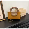 Bolsa de mão de luxo para comércio exterior, nova bolsa de balde retrô de nicho estilo coreano, bolsa de ombro estilosa, bolsa transversal da moda