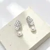 Nuevos Pendientes de Mariposa Dulces y Exquisitos Estilo Coreano Incrustados con Diamantes, Elegantes y Versátiles Clips para Orejas de Perla para Mujeres Sin Piercing