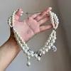 Gargantilha Choker Gravata Vazada de Design de Nicho Europeu e Americano, Colar Longo, Acessório Versátil e de Alta Qualidade para Meninas Modernas