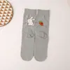 Calcetines AB para pies izquierdo y derecho calcetines para mujer algodón peinado talón recto personalidad gatito asimétricos Corea del Sur ins modernos calcetines de longitud media