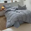 Juego de cuatro piezas de algodón 100% teñido en hilo de algodón lavado Clase A con patrón de jacquard a rayas, conjunto de pijama de estilo japonés de algodón puro para dormitorios de estudiantes