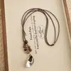 Collar colgante con cuentas de piedra ojo de tigre metálico de diseño original, cadena para suéter de cordón de cuero negro largo de nicho de alta gama