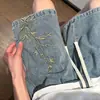 Nuevos shorts de mezclilla bordados en bambú estilo chino para hombre, estilo fino de verano, shorts casuales lavados de alta costura para pareja