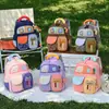 Mochila nueva de dibujos animados para niños, moderna y ligera, bolsa escolar para estudiante de jardín de infantes, mochila pequeña de aspecto atractivo para ocio al aire libre