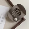 Rascador de Pelo Perla Negra Vintage para la Parte Posterior de la Cabeza Disco Pinza de Pato para el Cabello 2025 Nuevo Todo-partido Sentido de Alta Gama Pasador para el Cabello de la Parte Posterior de la Cabeza