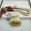 Nova Chaveiro Talismã da Sorte em Ouro 999 Corrente de Celular Pingente Decoração de Bolsa Presente para Namorada