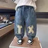 Pantalones Vaqueros de Primavera y Otoño para Niños Estilo Coreano Infantiles Guapos Holgados Modernos Casuales para Niños Pequeños y Niños Pequeños Pantalones Estilo Calle Comercio Exterior