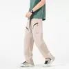 Enviado directamente desde fabricantes de comercio exterior, Pantalones casuales de moda, Pantalones funcionales de trabajo transpirables de color liso para exteriores, Pierna recta holgada, Multibolsillos