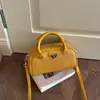 Bolso Pequeño de Mano Versátil de Textura Tejida de Verano para Mujer 2026 Nuevo Bolso Boston Almohada de Alta Calidad Bolso Cruzado Elegante